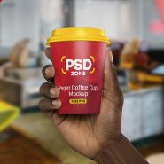 Hand Holding Paper Cup Mockup PSD