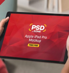 iPad Pro in Hand Mockup PSD